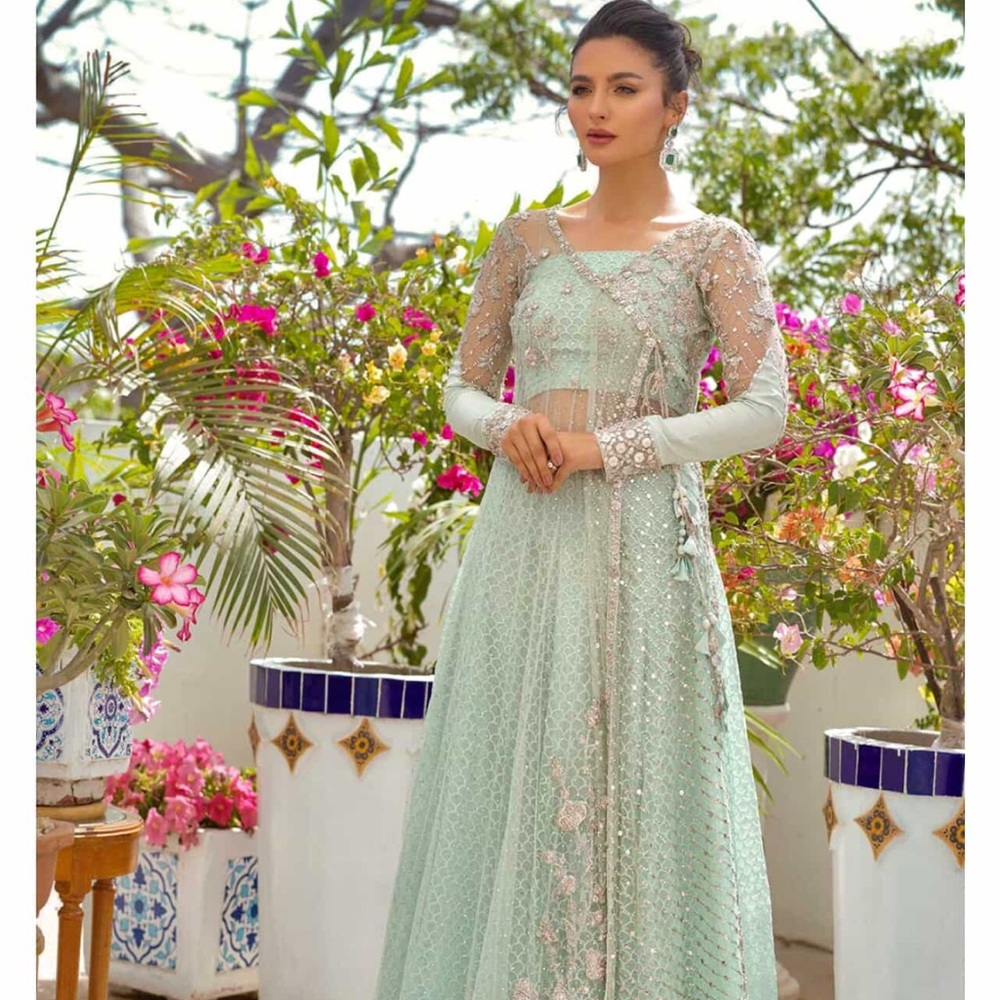 Elegant Mint Green Lace Dress
Nadia Farooqui original Pakistani designer